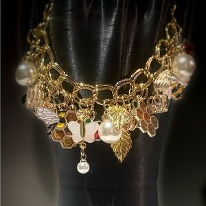 Gold Charm Bracelet with Pearls and Butterfly Accents